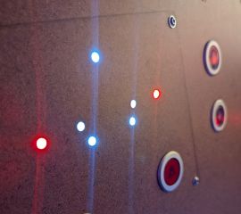 Performing an integration test of the (bright) LEDs in a hardboard version of their panel