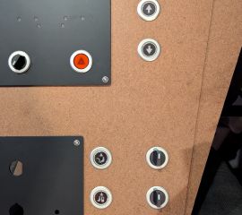Testing headlight and environmental controls with sheet metal panels