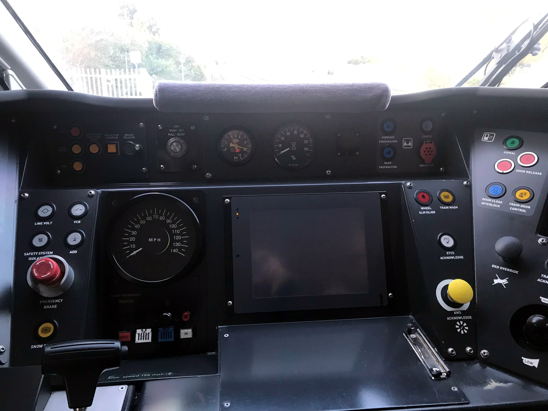 Photograph of cab of UK Class 802 passenger train, showing center control panel